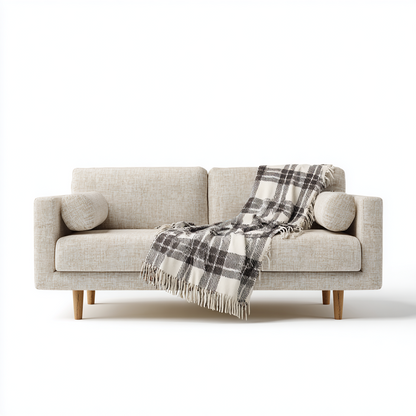 Sofá de Dos Plazas en Tela Beige con Cojines Cilíndricos y Manta Decorativa